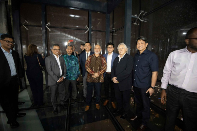 Attendees got an extra treat with a swift ride to the 116th floor observatory, where they could walk on a glass floor more than 500 meters in the air.