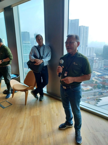 Tun Razak Exchange (TRX) Off-Site Program: Attendees toured Raintree Plaza, the northwest pedestrian gateway into Tun Razak Exchange, and TRX City Park, a lush rooftop park that is a multi-level and multi-experiential public venue The tour also included a visit to the TRX City headquarters office onsite and their development scale model. Image: Daniel Safarik