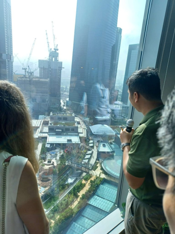 Tun Razak Exchange (TRX) Off-Site Program: Attendees toured Raintree Plaza, the northwest pedestrian gateway into Tun Razak Exchange, and TRX City Park, a lush rooftop park that is a multi-level and multi-experiential public venue The tour also included a visit to the TRX City headquarters office onsite and their development scale model. Image: Daniel Safarik